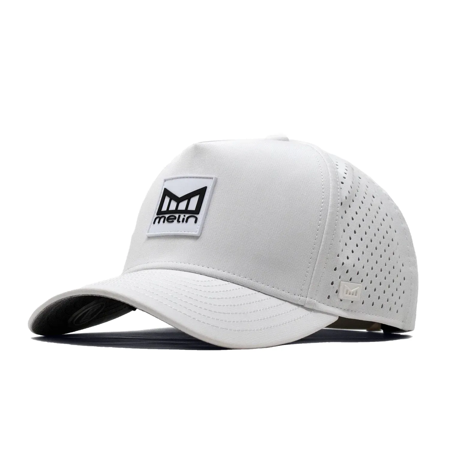 Melin Odysea Stacked HYDRO hat in white with stacked logo patch and curved brim.