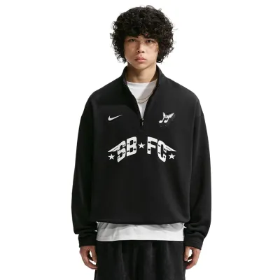Lifestyle front view of the Black Nike SB FC Half Zip Crewneck Sweatshirt on model.