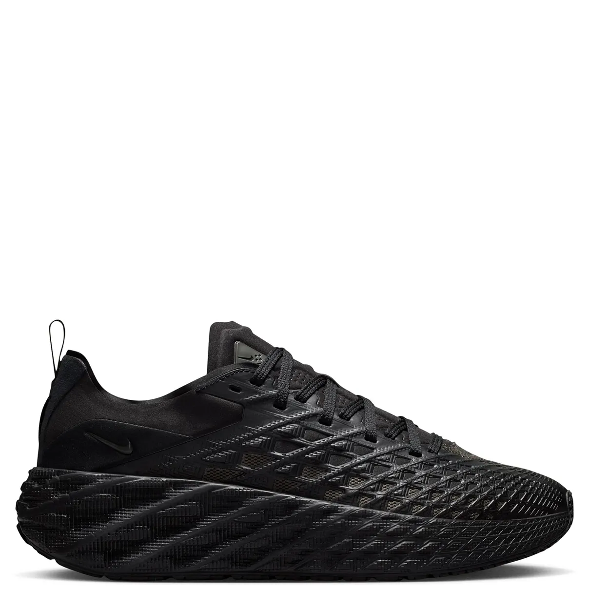 Medial side profile of Nike Ava Edge featuring woven grid upper, black Swoosh, and oversized textured midsole.