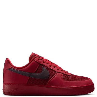 Medial side profile of Nike Air Force 1 '07 LV8 featuring premium leather and textured canvas panels.