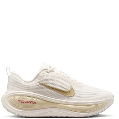 Lateral side profile of Nike Women's Vomero Plus highlighting full-length ZoomX foam cushioning