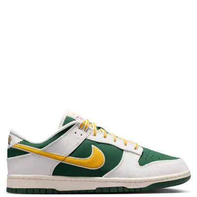 Medial side profile of Nike Dunk Low Retro with embroidered gold Swoosh