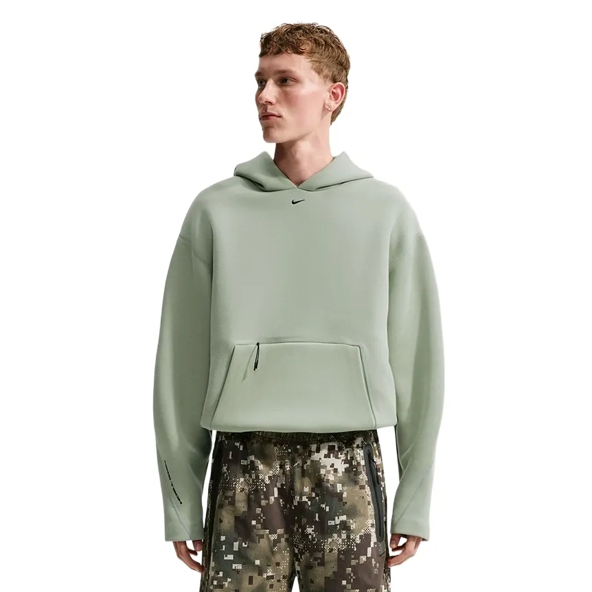 Front view of Nike Tech Fleece Pullover Hoodie in Jade Horizon with zippered pouch pocket