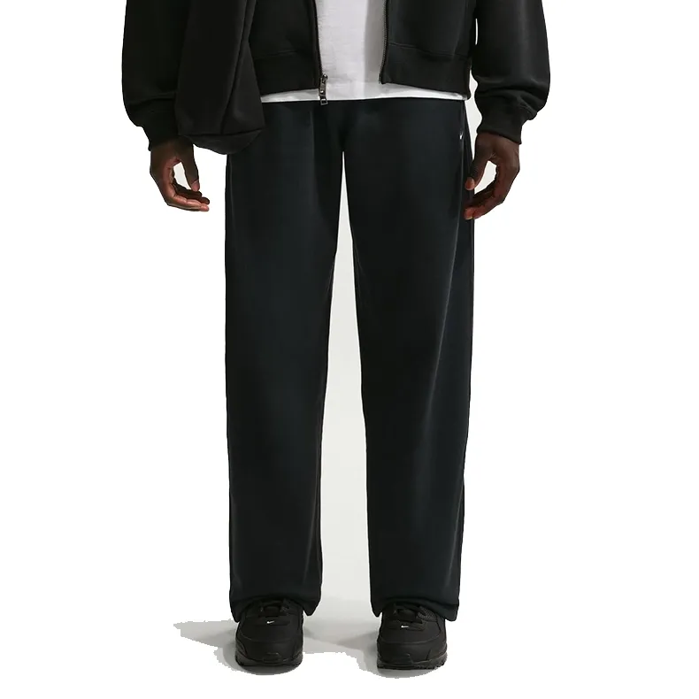 Front view of Nike Solo Swoosh Open-Hem Pants in Black