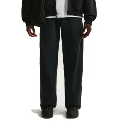 Front view of Nike Solo Swoosh Open-Hem Pants in Black