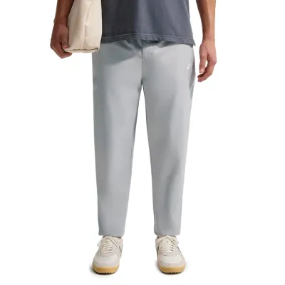 Front view of Nike Club Woven Taper Pants in Smoke Grey