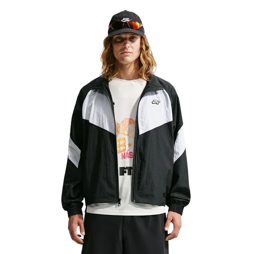 Front view of Nike SB Pavan Jacket in Black/White with oversized fit and Chevron design