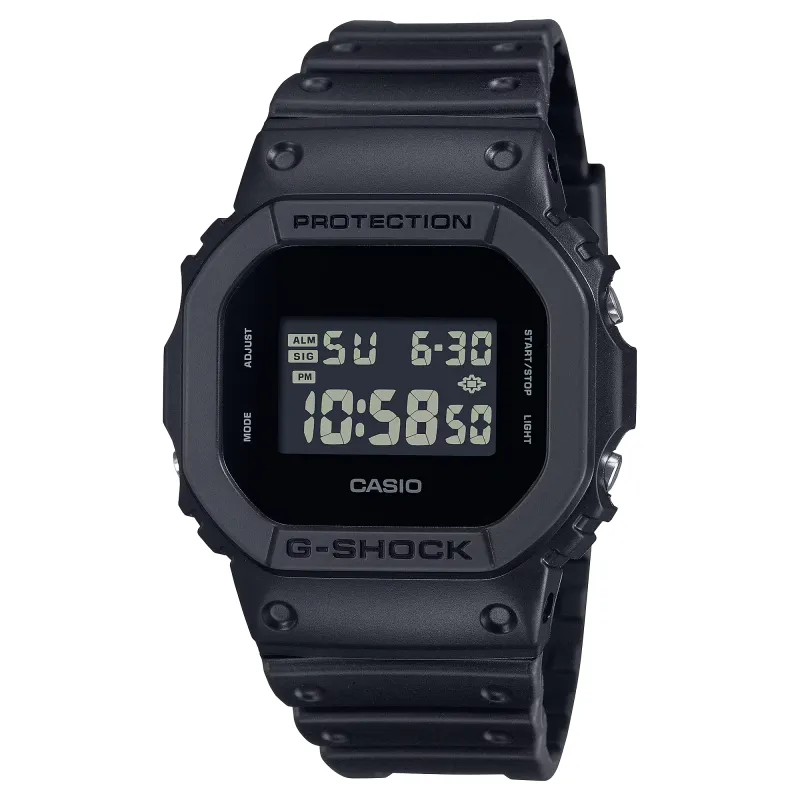 Angled front view of the all-black G-Shock DW5600UBB-1 with a square case and reverse digital display.