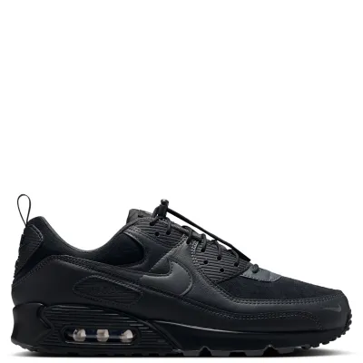Lateral side profile of Nike Air Max 90 in Black/Iron Grey with visible Max Air cushioning