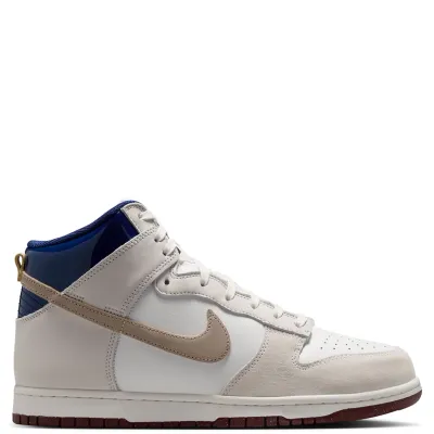 Medial side profile of the Nike SB Dunk High Pro with premium leather upper and suede overlays.