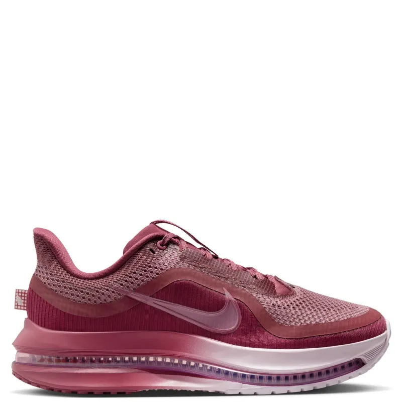 Lateral side profile of Nike Women's Pegasus Premium with oversized Swoosh and visible Air unit
