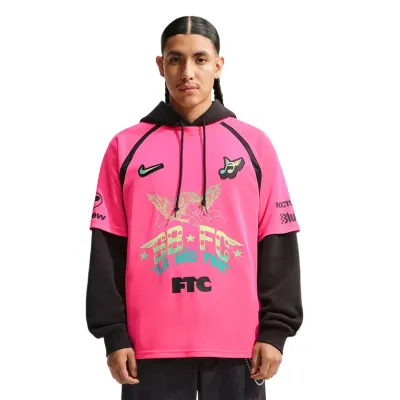 Front view of Nike SB La Más Fina FC Soccer Jersey in Hyper Pink with bold Club 58 graphics