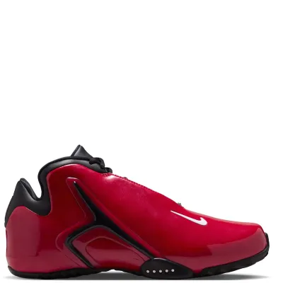Medial side view of red Nike Zoom Hyperflight with white Swoosh, black support frame and rubber outsole.