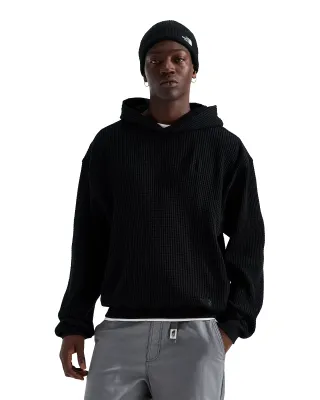 Front view of model wearing The North Face Chabot 2.0 Hoodie in black with textured fabric, hood and ribbed hem.