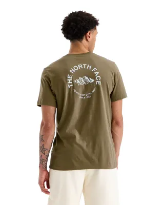Back view of The North Face Evolution NSE Tee in Caraway Seed with large mountain-inspired logo graphic.
