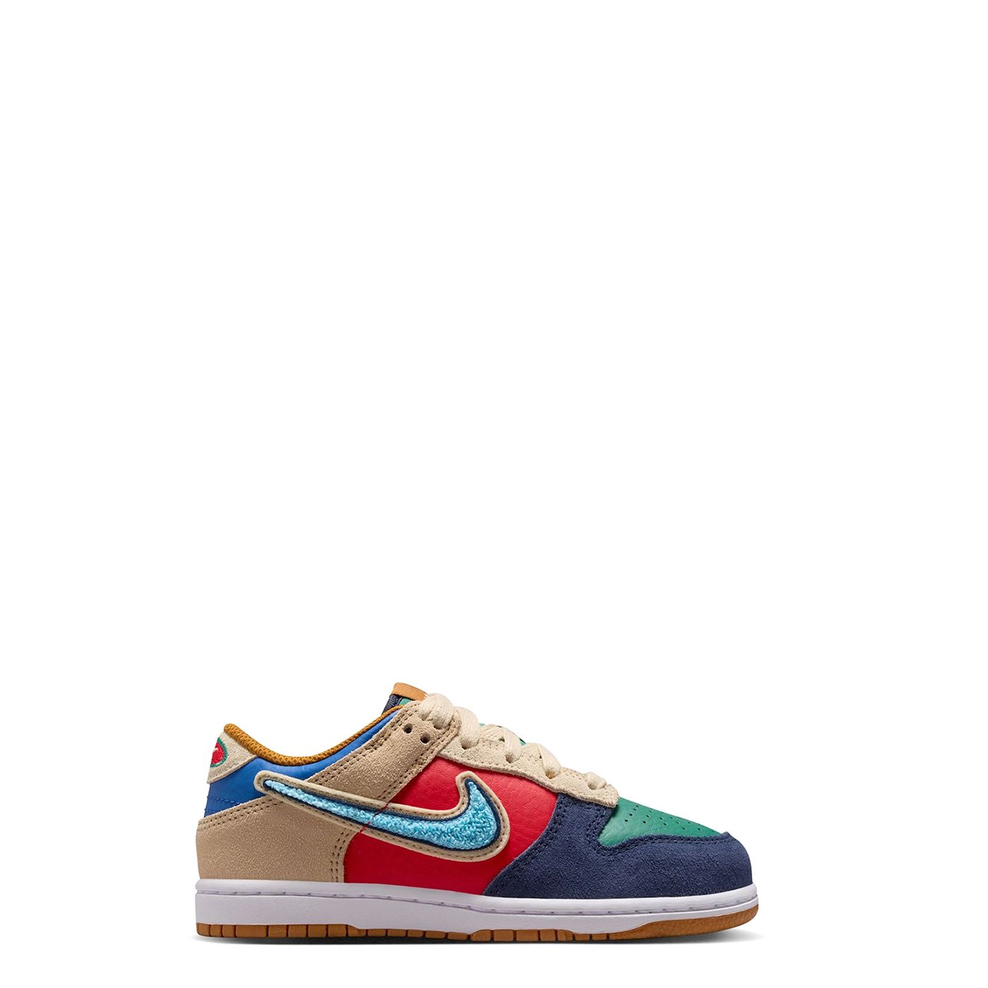 Medial side profile of Nike Dunk Low PS with blue chenille Swoosh and colorful panels.
