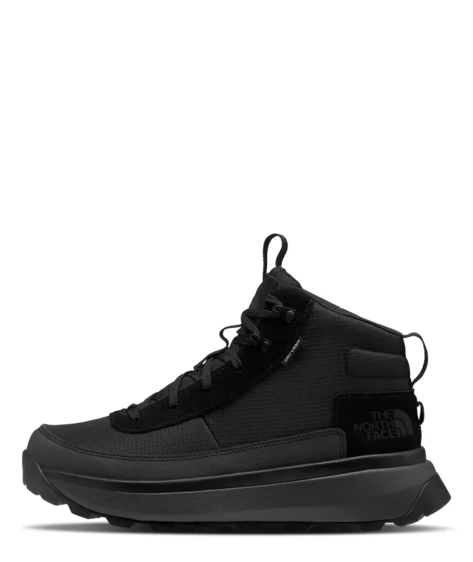 Side view of The North Face Bergen Mid Waterproof boot in black with suede panels, DRYVENT branding and rugged sole.