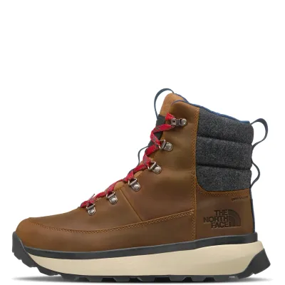 Side view of The North Face Bergen Leather WP boot showing brown leather, padded collar and lugged outsole.