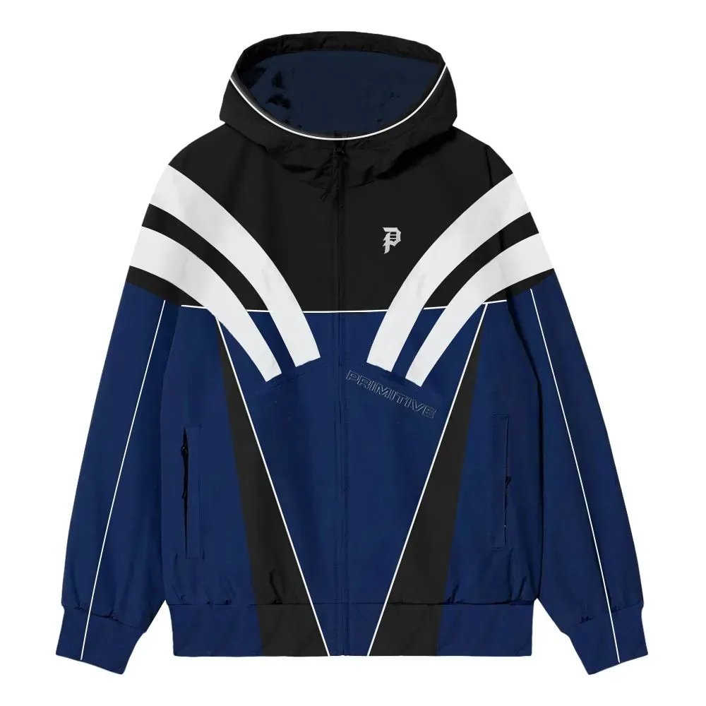 Front view of Primitive Striker Tech Jacket in blue with black and white color blocking, hood, and full-zip closure.