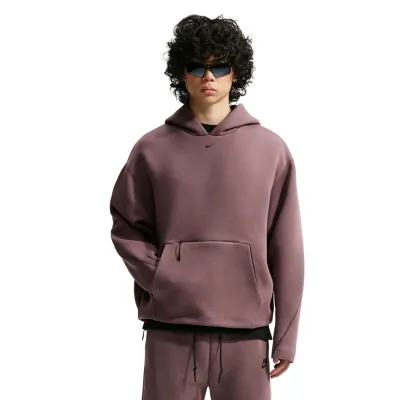 Front view of the Tattoo Nike Tech Fleece hoodie showing its roomy fit, structured hood and pouch pocket.