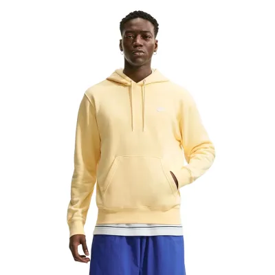 Front view of the Soft Yellow Nike Club Hoodie showing the drawcord hood, Futura logo and pouch pocket.