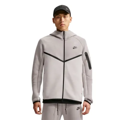 Front view of the Nike Tech Fleece Windrunner showing its full zipper, contrast trim and sleeve pocket.