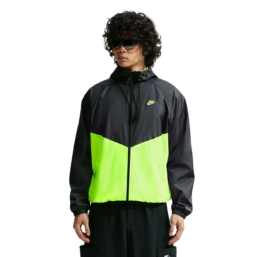Front view of the Black and Volt Nike Windrunner Jacket showing the hood, two-way zipper and chevron panels.