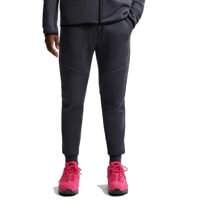 Front view of Gridiron Nike Tech Fleece Joggers showing articulated seams, black drawcord and tonal logo.