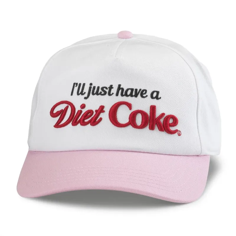 Front view of white Diet Coke Roscoe hat with embroidered slogan, red logo and contrasting pink curved visor.