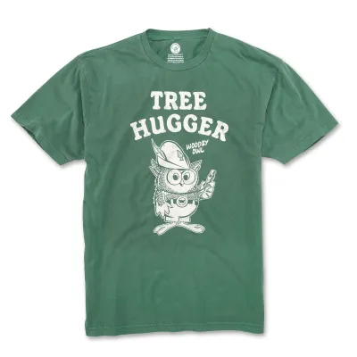 Green American Needle Woodsy Owl tee with distressed white Tree Hugger character graphic on the front.
