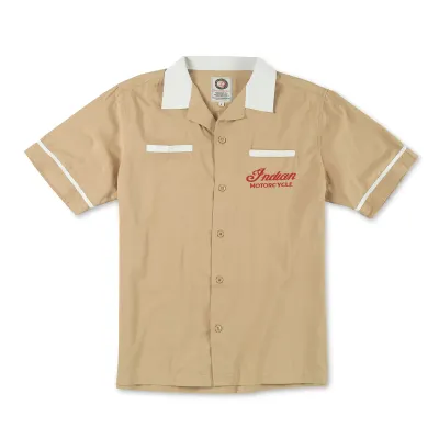 Front of sand Indian Motorcycle Lebowski shirt with ivory collar, two chest pockets and red embroidered logo.