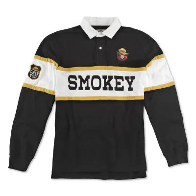 Black Smokey Bear rugby polo with white collar, gold-striped panel, embroidered chest graphic and Only You sleeve patch.