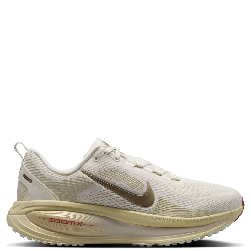 Medial side view of Nike Women's Vomero 18 with sculpted foam midsole and streamlined upper.