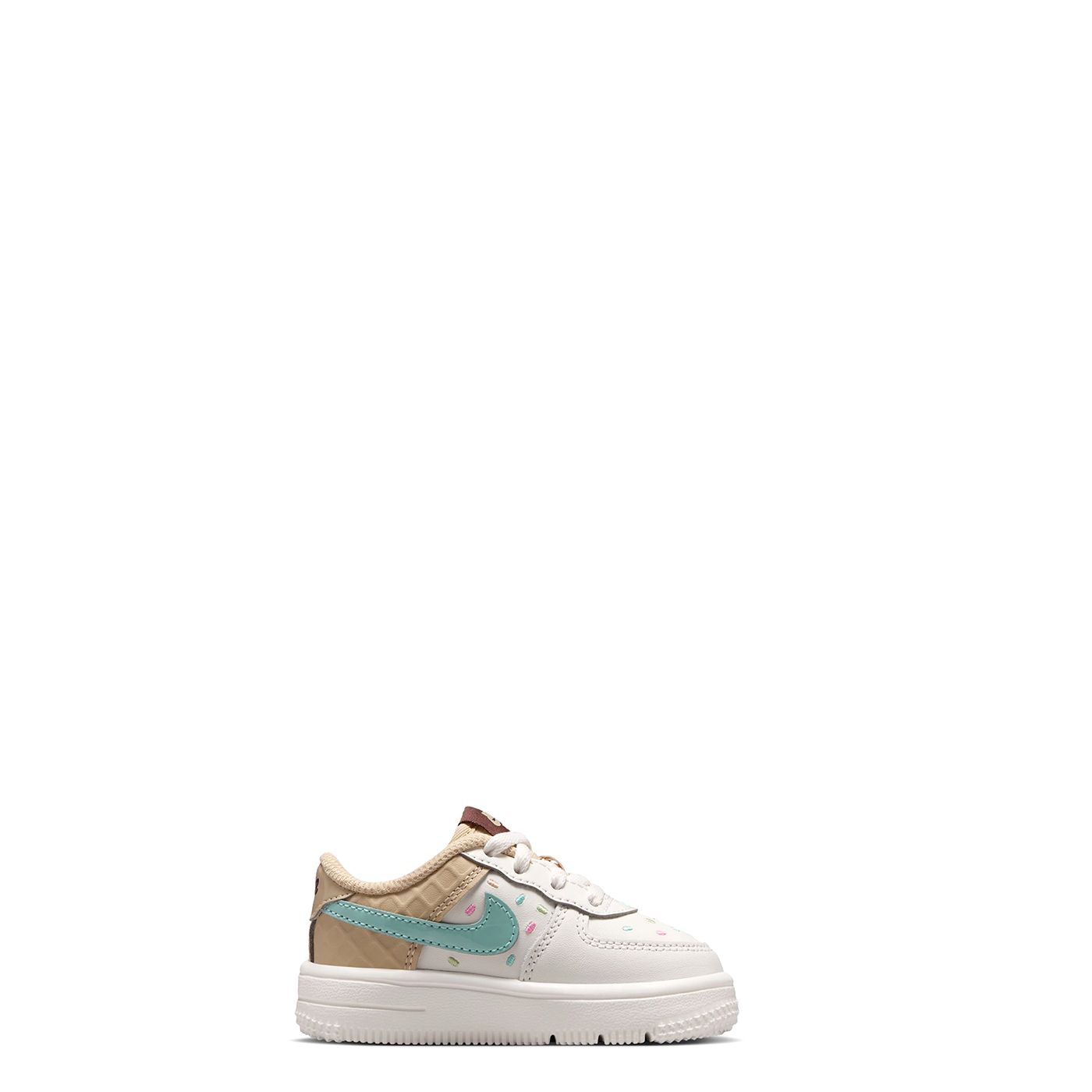 Side view of Nike Force 1 Low toddler shoe with turquoise Swoosh, sprinkle accents and white sole.
