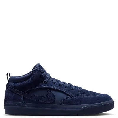 Lateral view of Nike SB React Leo Navy showing suede overlays, satin side panel, tonal Swoosh and rubber sole.