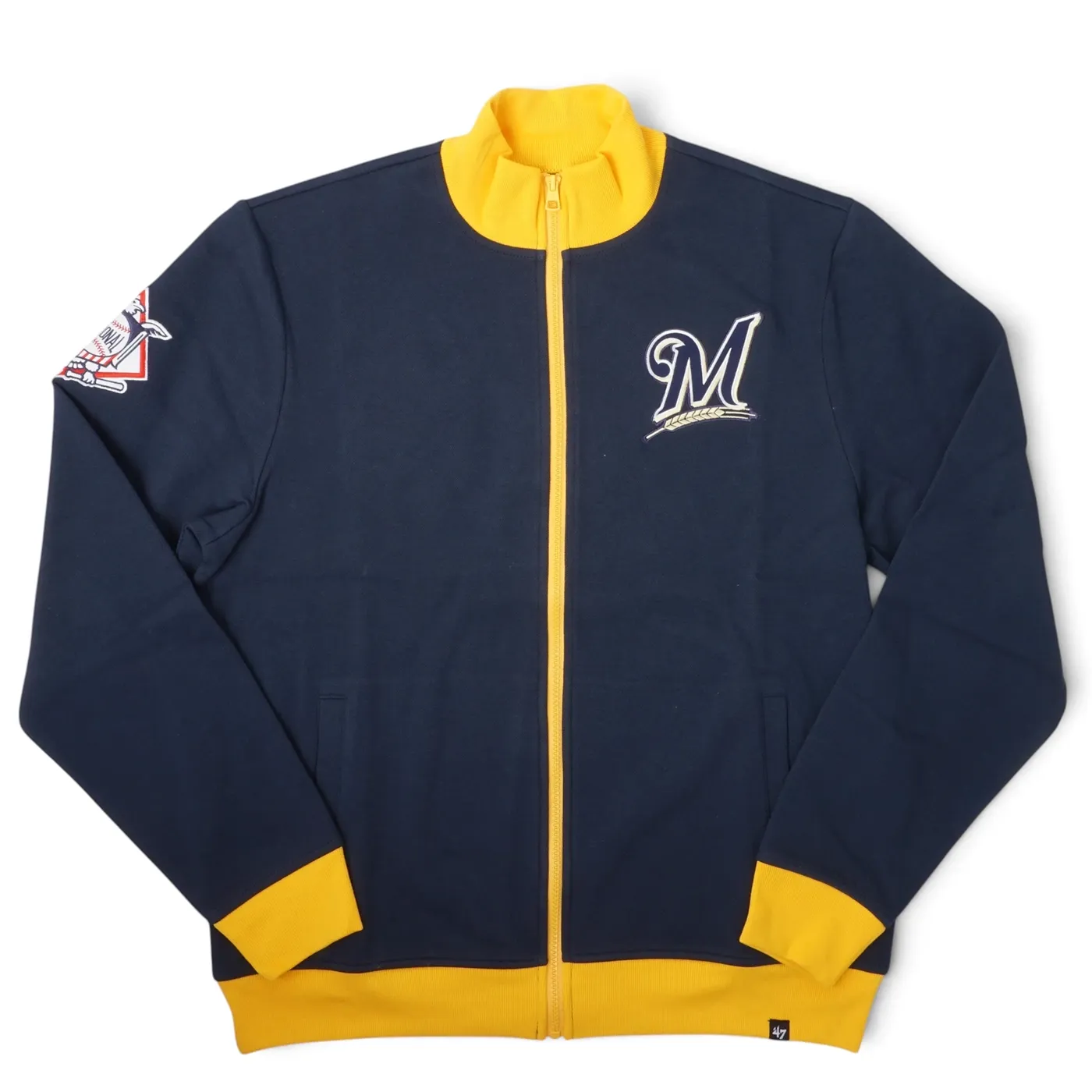 Front view of the navy ’47 Brewers Relief Pitcher Track Jacket with a barley logo, gold zipper and gold ribbed trims.