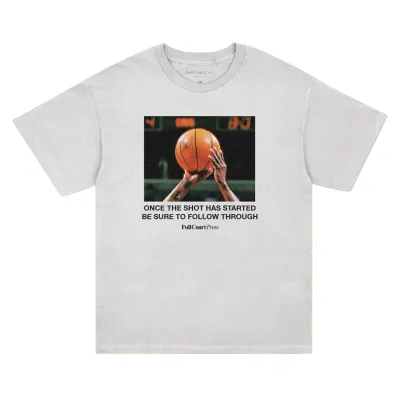 White Full Court Press Follow Through tee with a basketball shooting photo and bold instructional text on the front.