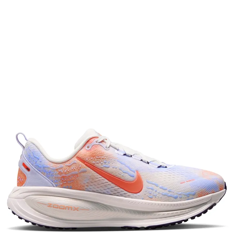 Medial view of Nike Women's Vomero 18 showing colorful engineered mesh, Hyper Crimson Swoosh and ZoomX branding.