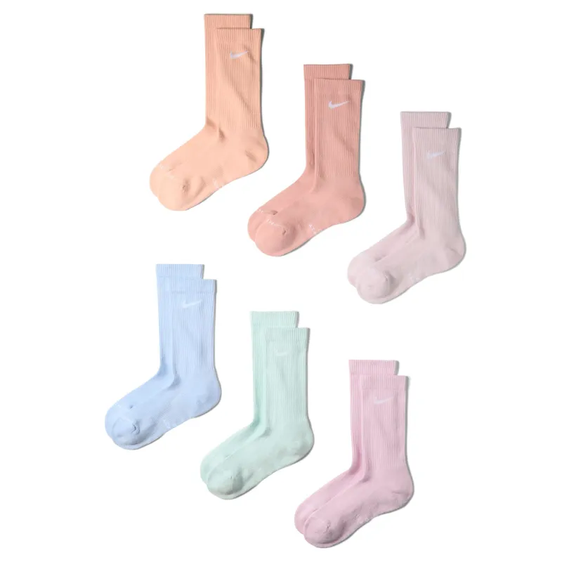 Six pairs of Nike Everyday Elevated crew socks in assorted peach, pink, blue, mint and lavender pastel colors.