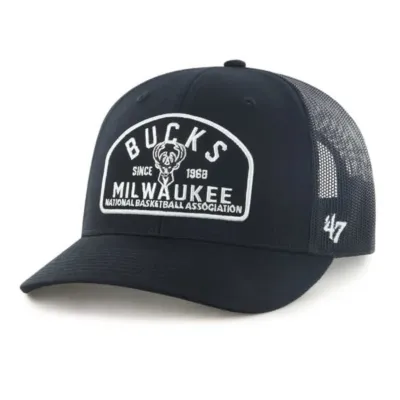 Angled front view of black ’47 Bucks Leland Trucker Hat with raised white team graphic and mesh back.