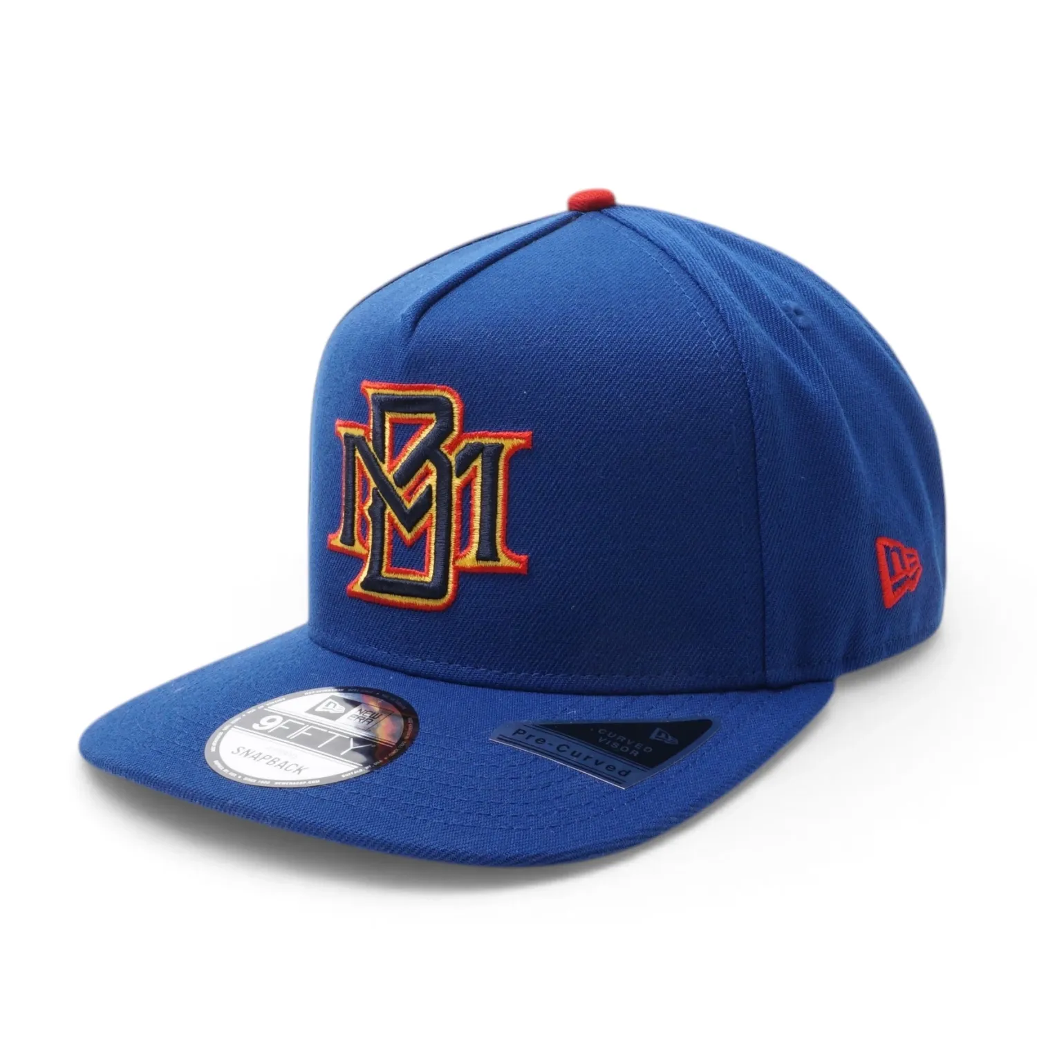Angled front view of royal blue Brewers A-Frame hat with MB logo and red New Era flag