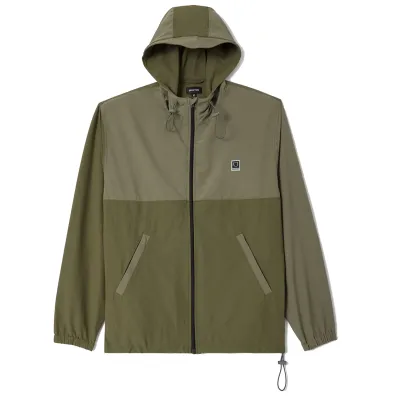 Front view of the two-tone olive Brixton Journey Zip Jacket with visor hood, zip pockets and adjustable shock cords.