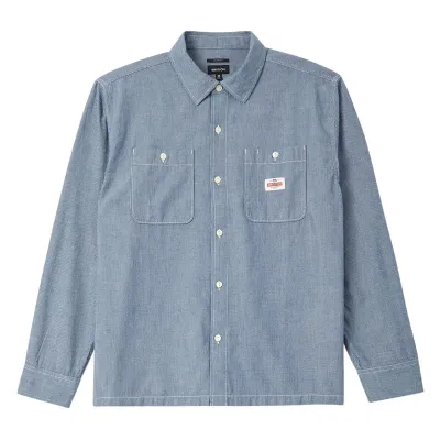 Front view of the Brixton Trademark Shirt in blue chambray micro stripe with two buttoned chest pockets
