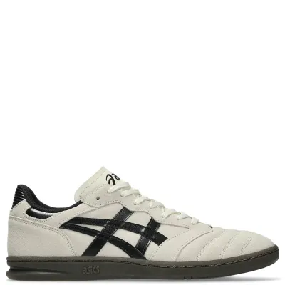 Medial view of cream ASICS Leggerezza ST shoe with black stripes, suede paneling and a low-profile sole.