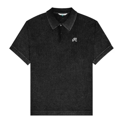Front product view of the black Malbon Brickwork Polo with short sleeves, ribbed trims, and white chest logo.