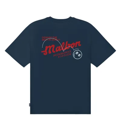 Back product view of the Blueberry Malbon Vista Demand Tee with red Ironworks Division and white golf ball graphics.