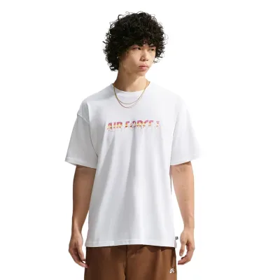 Front view of a model wearing the white Nike SB x Yuto tee with a multicolor Air Force 1 chest graphic.