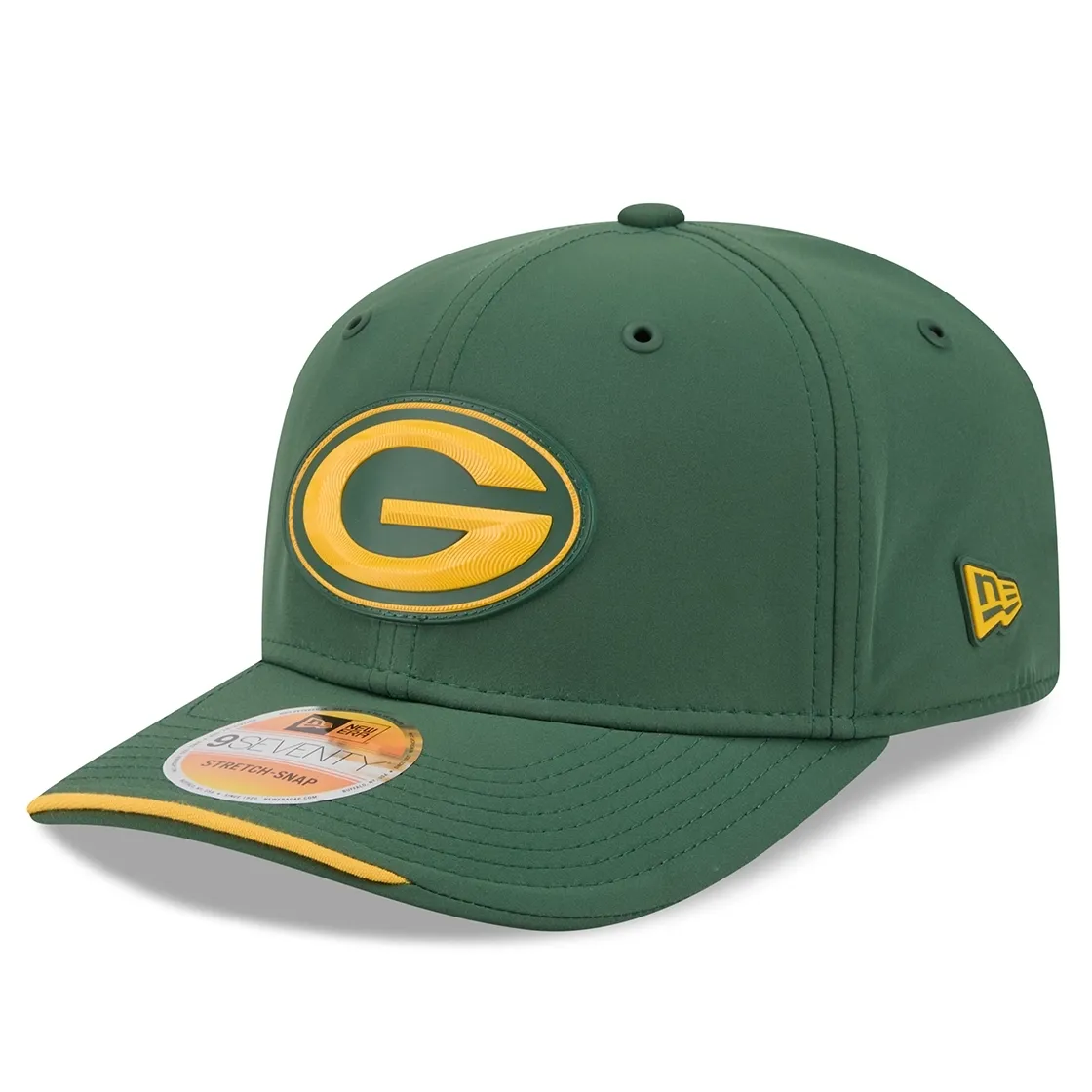 Left-angled view of green New Era Packers 9SEVENTY hat with a gold silicone logo and curved visor accent.