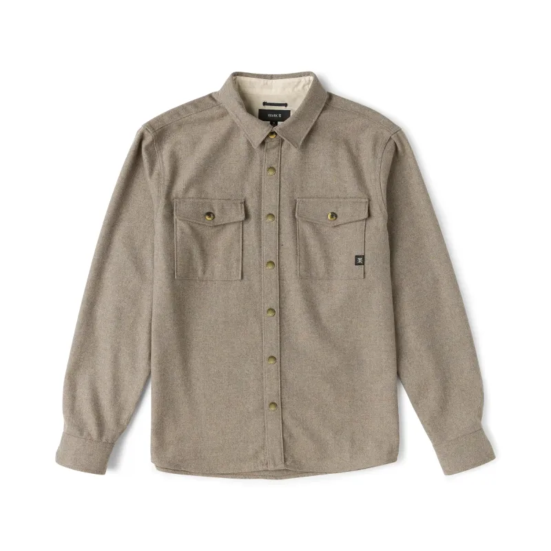 Front product view of the Dusty Green flannel with brass-tone snaps and dual chest pockets.