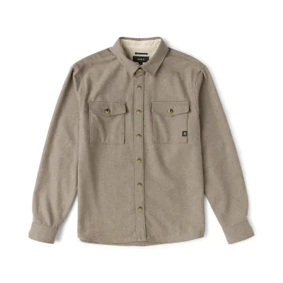 Front product view of the Dusty Green flannel with brass-tone snaps and dual chest pockets.